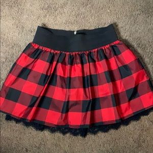 Red plaid pleated mini skirt